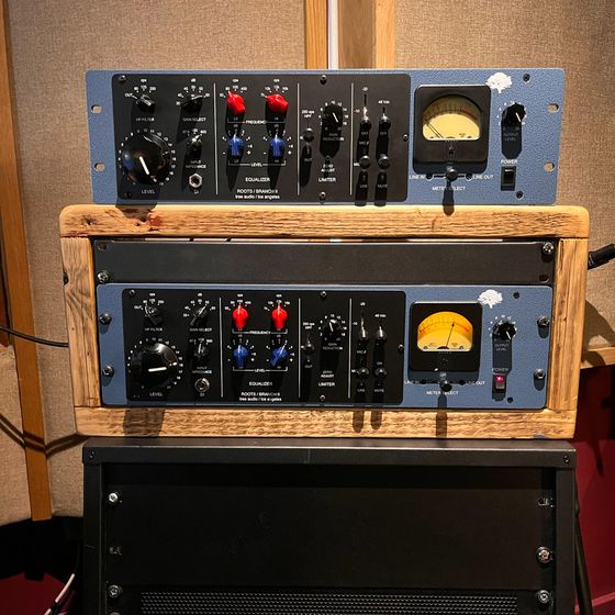 Outboard in a wooden rack, September 2023