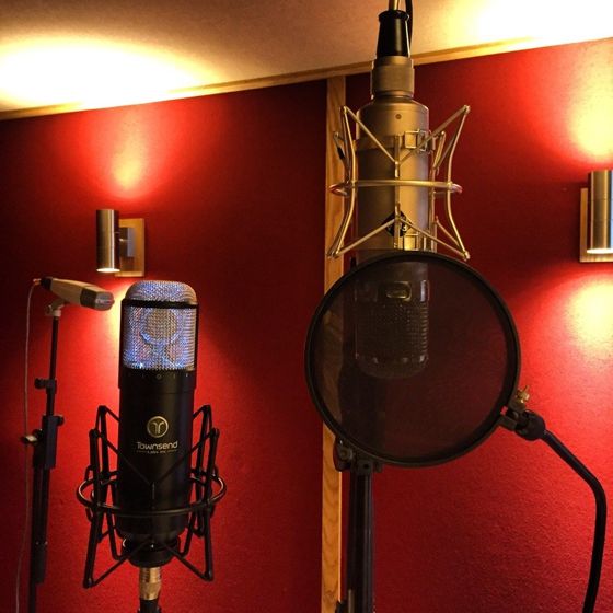A mic against the red wall, July 2018