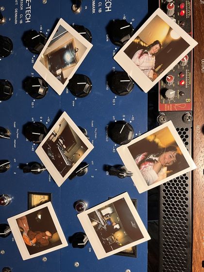 Polaroids pinned to the front of the rack, September 2023